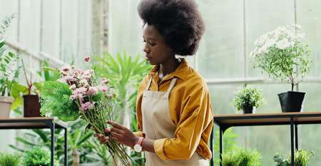 Female florist flower arranging Female florist flower arranging
