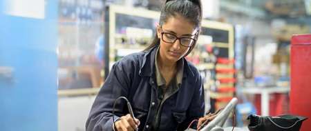 Young woman in workshop